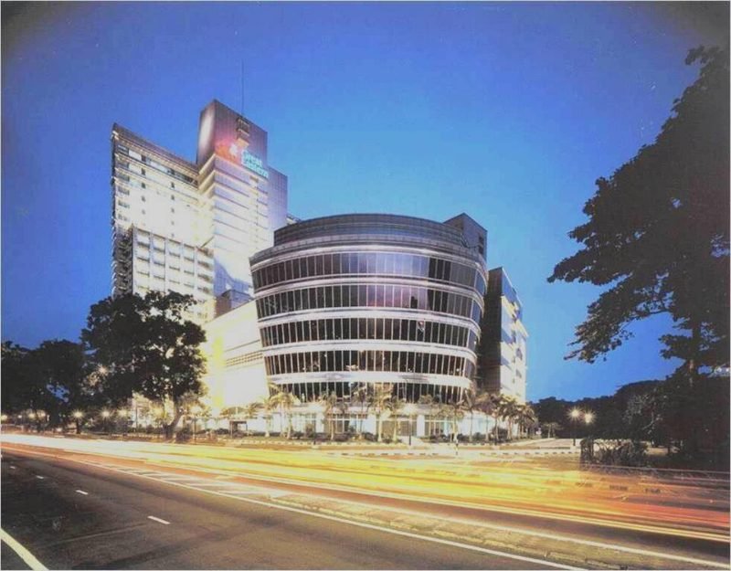 How InvestKL Helps MNCs Land in Greater KL (And What It Costs — office tower in Kuala Lumpur